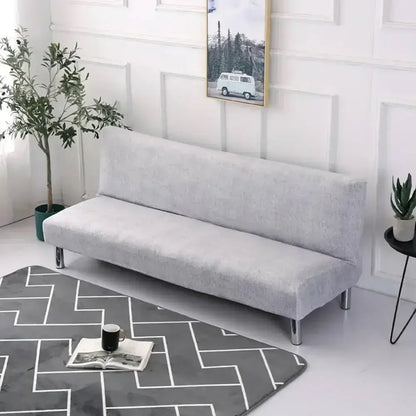 Gray fabric decorbites armless futon sofa cover with elastic slipcover and sleek metallic legs for futon sofa