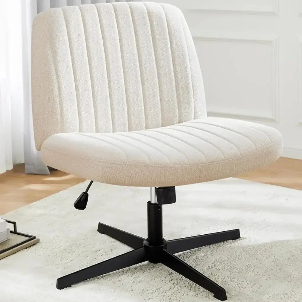 Cream-colored upholstered decorbites armless wide desk chair with vertical ribbed texture and black five-star base