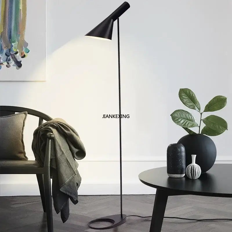 Black conical floor lamp with sleek metal finish featuring decorbites arne jacobsen corner modern design