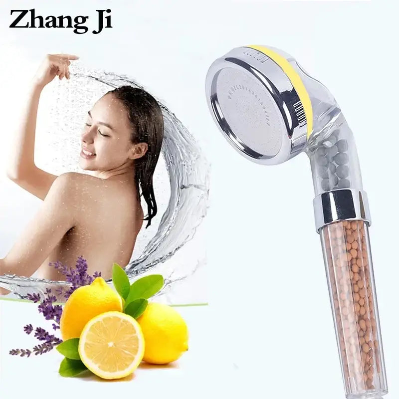 Clear chrome decorbites aroma shower head with yellow accent and visible filtration beads for high pressure water filtration