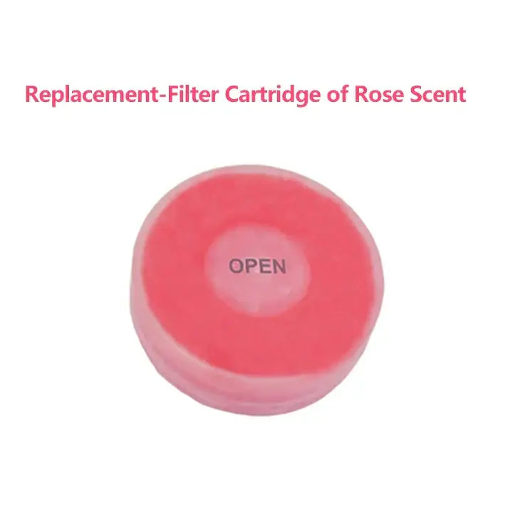 Pink circular replacement filter cartridge with open printed in center for decorbites aroma shower head filtration