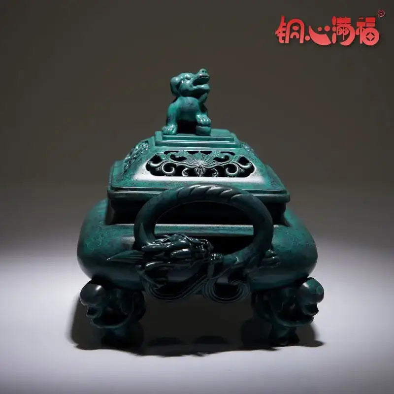 Teal-green bronze aromatherapy brass incense stove with intricate dragon and lion motifs by decorbites for home decor