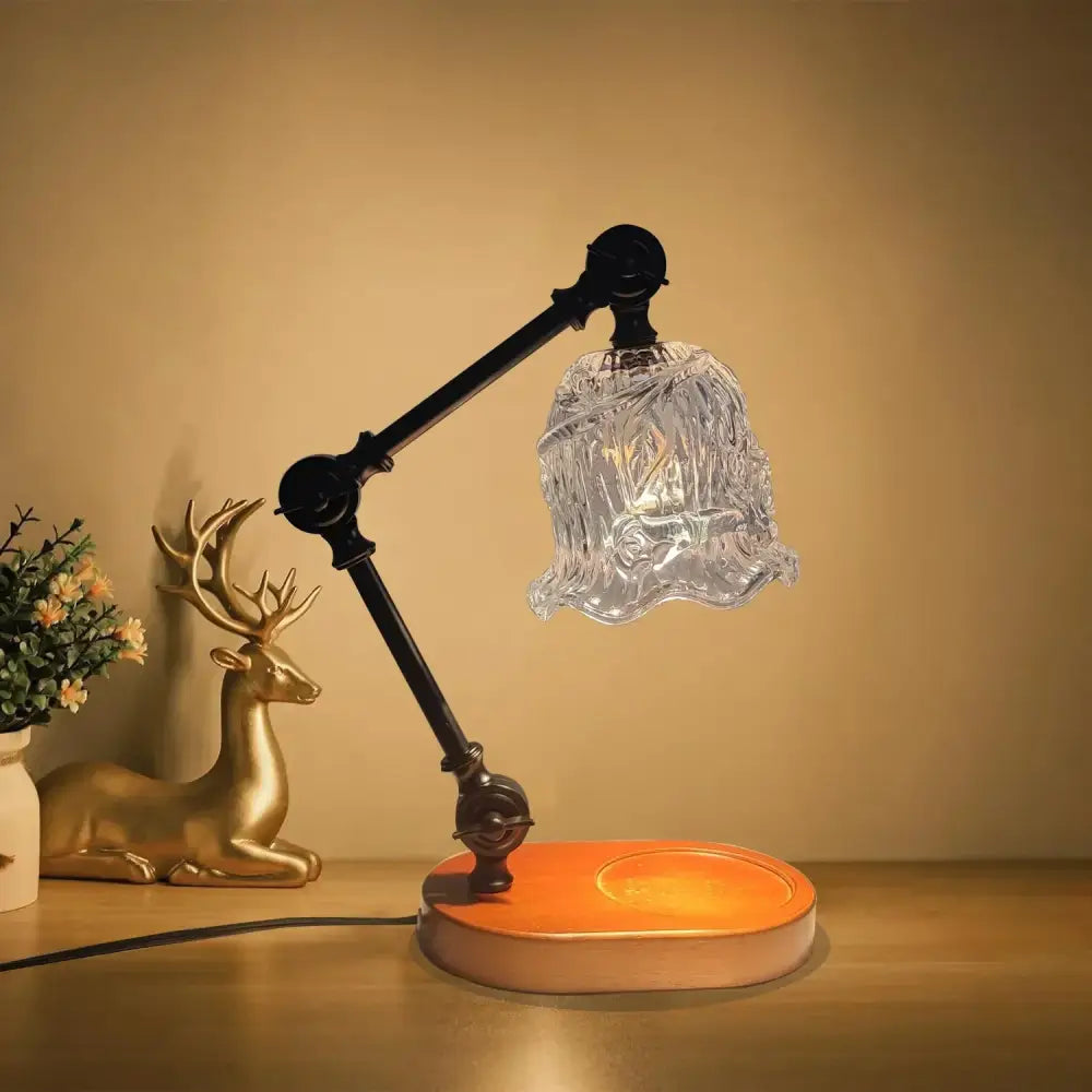 DecorBites™ wax melting lamp with black articulated arm and ornate clear glass shade for aromatherapy and ambiance