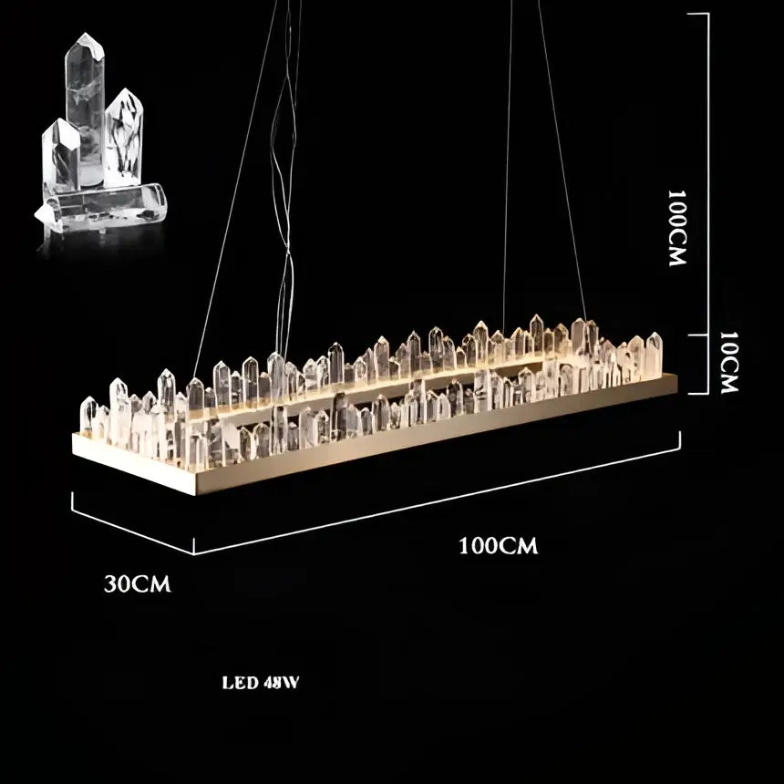 A modern decorbites arrow crystal led chandelier with a gold base and clear faceted crystals for living dining rooms