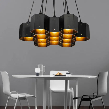Art deco black metal hexagonal pendant ceiling light with gold interior panels for dining room by DecorBites