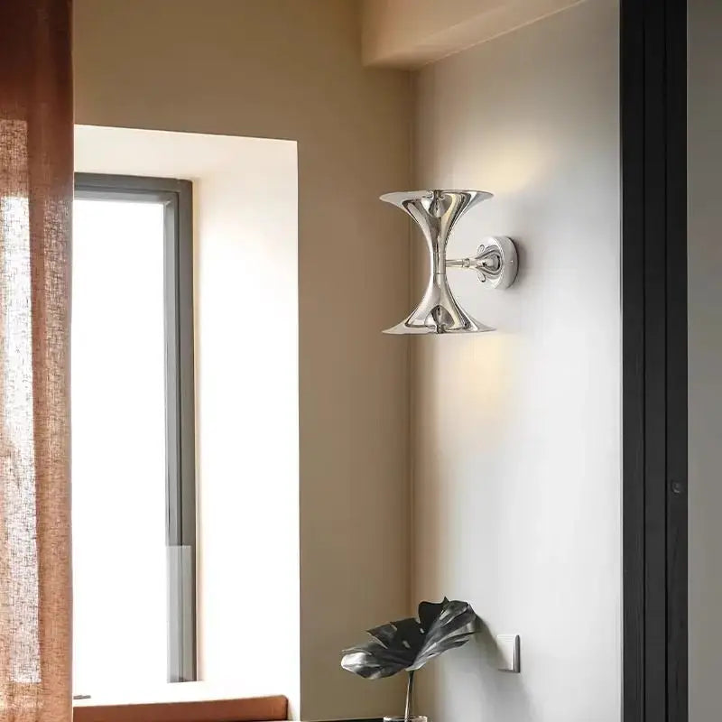 Decorbites™ art deco chrome horn wall lights featuring sleek chrome finish and sculptural curved arms for indoor use