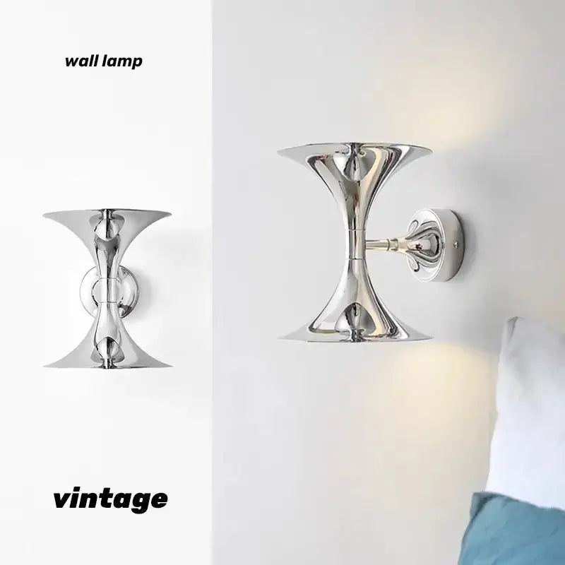 Decorbites™ art deco chrome horn wall light with sculptural hourglass design for bedroom and living room lighting