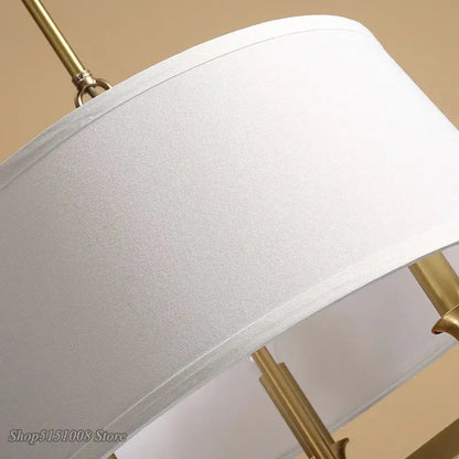 Decorbites art deco pendant light with white fabric drum shade and polished brass hardware for elegant interior lighting