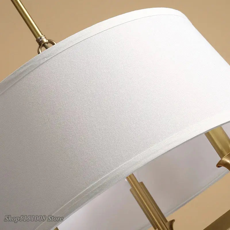 Decorbites art deco pendant light with white fabric drum shade and polished brass hardware for elegant interior lighting