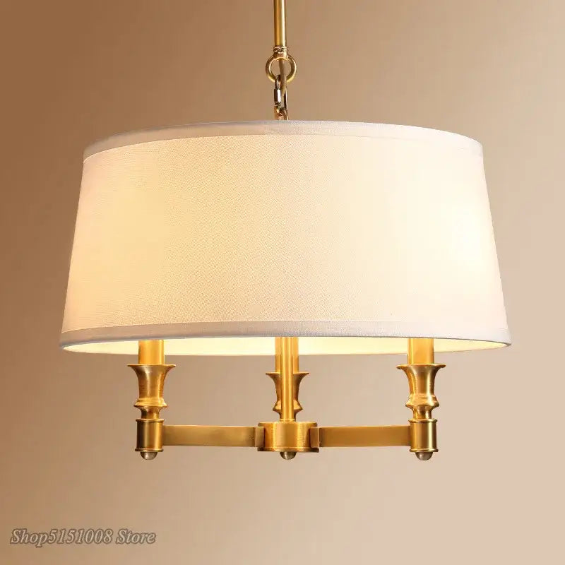 Decorbites art deco pendant light with gold-toned chandelier, white fabric shade, and three candle-style arms for elegant lighting
