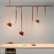 Modern red leather cross belt hanging lamp with orange lustre finish and minimalist design for living room decor