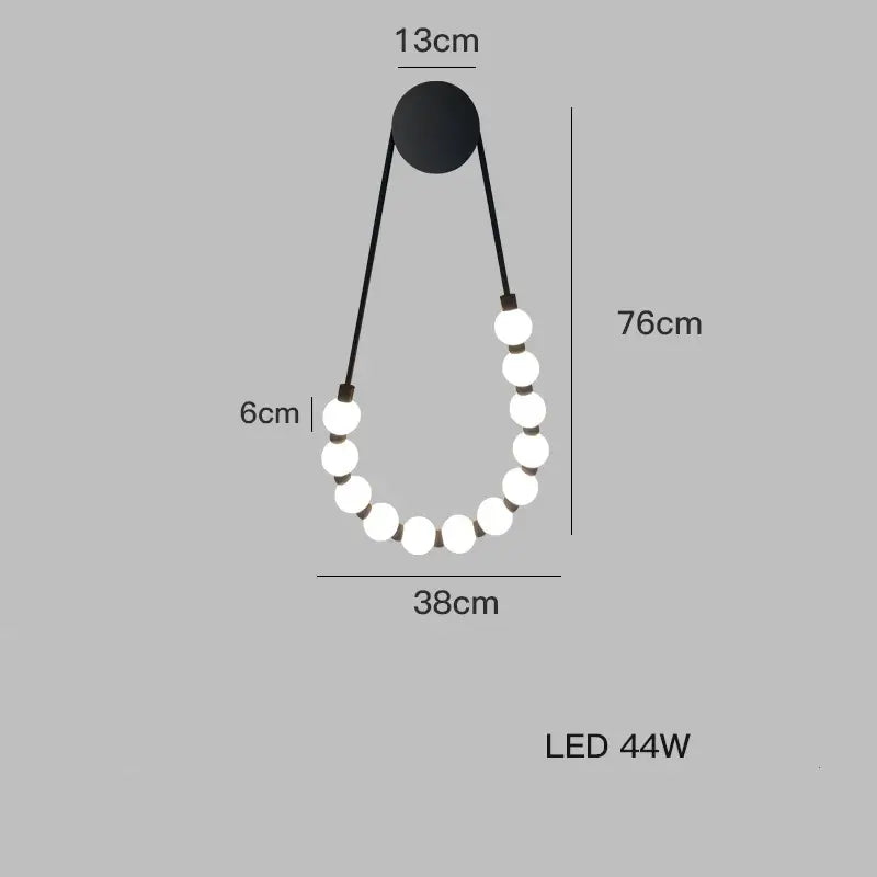Decorbites™ art deco black gold led wall sconce with sleek circular fixture and ten glowing white glass bulbs