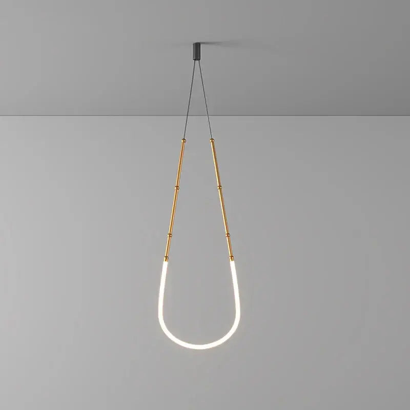 DecorBites art deco gold black LED pendant light with teardrop design and gold bamboo rods for dining room