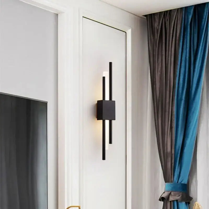 Black modern wall sconce with sleek vertical bars and square base for decorbites art deco marble accent lighting