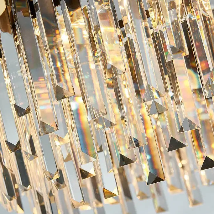 Decorbites art deco golden black crystal pendant lights with cascading clear prism crystals refracting rainbow hues