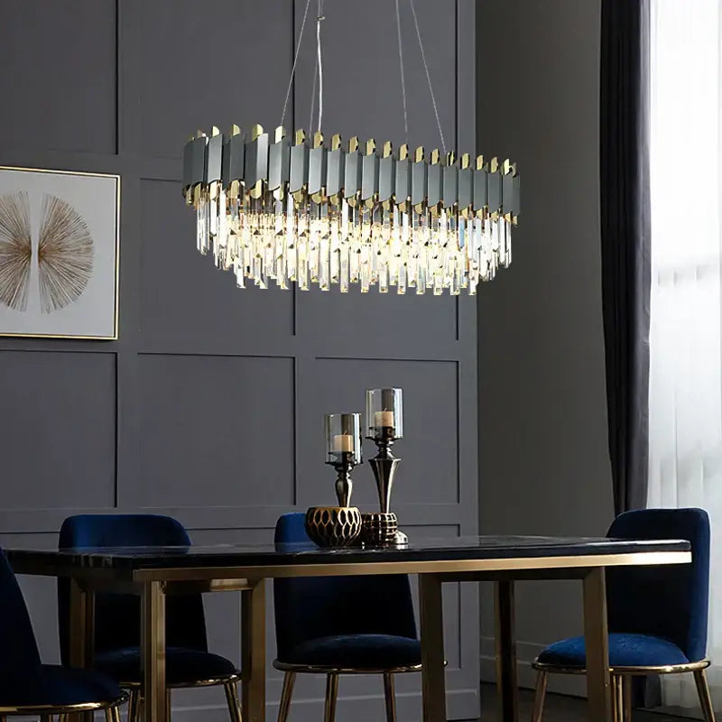 A modern decorbites art deco pendant light with a golden black frame and clear crystal prisms for dining room use