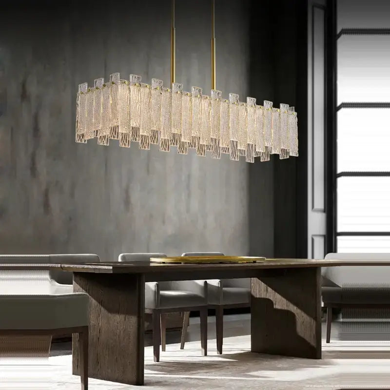 A modern decorbites art deco rectangular chandelier with cascading crystal prisms and deco golden copper rods