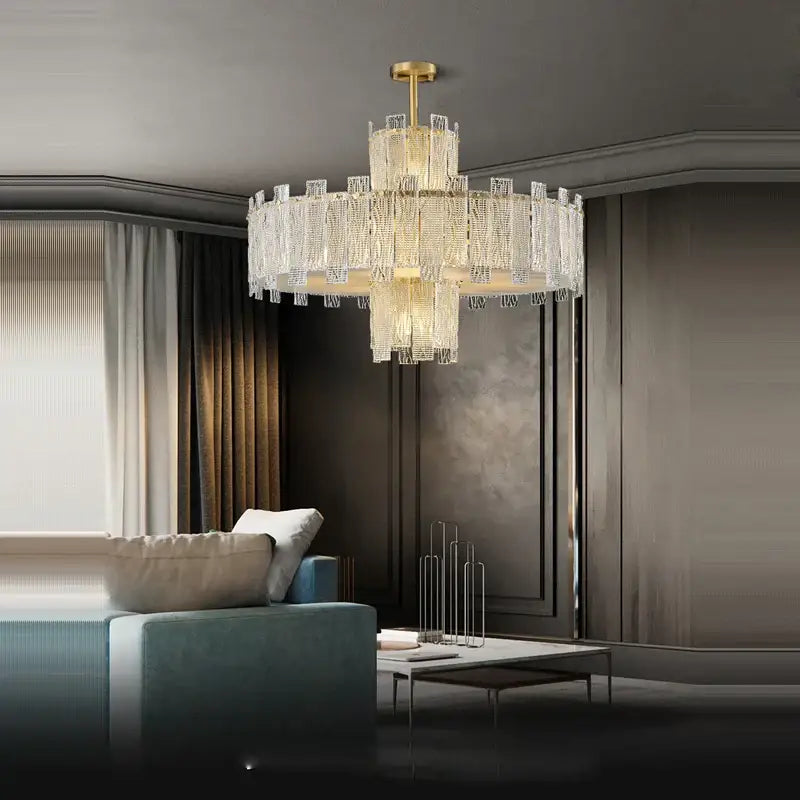 Decorbites art deco multi-tiered chandelier with cascading crystal prisms and polished deco golden copper finish