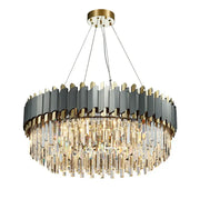 Modern chandelier with matte black and gold accents and cascading clear crystal prisms decorbites art deco style
