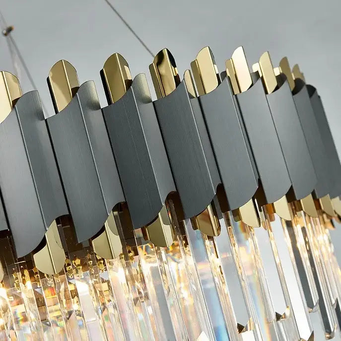 Modern chandelier with black and gold metallic plates and crystal prisms in decorbites art deco gray and gold foyer light