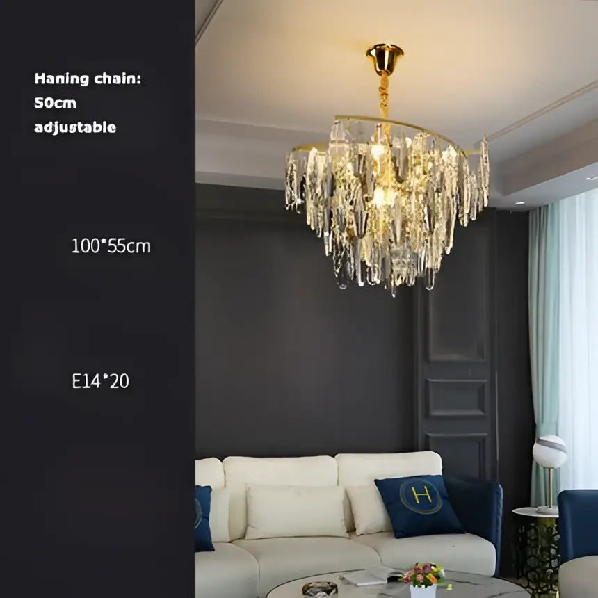 Crystal chandelier with gold-toned metal frame and clear crystal droplets from decorbites art deco led lighting collection