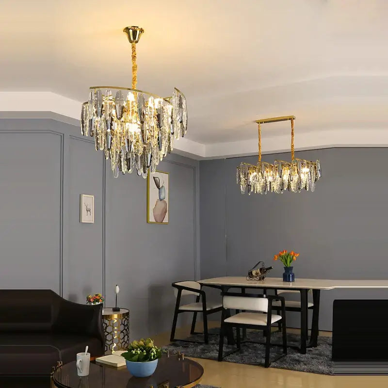 Gold-toned decorbites art deco led crystal chandelier with cascading droplets and elegant design for foyer lighting