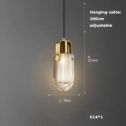 A modern decorbites art deco pendant light with clear glass body gold-toned metal accents and e14 bulb socket