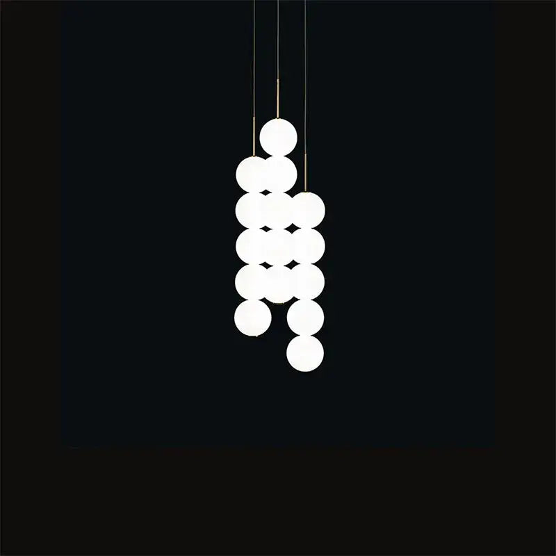 White spherical glass pendant light with modern minimalist design from decorbites art deco led collection in gold chrome black
