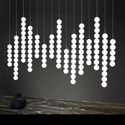 Modern white spherical pendant light in geometric pattern by DecorBites Art Deco LED glass pingpong in gold chrome black