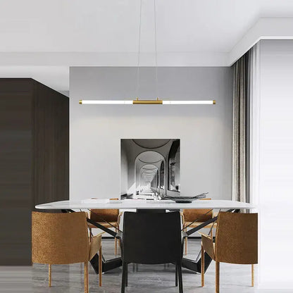 Gold-toned linear pendant light with sleek minimalist design for dining room by decorbites art deco led gold chandelier
