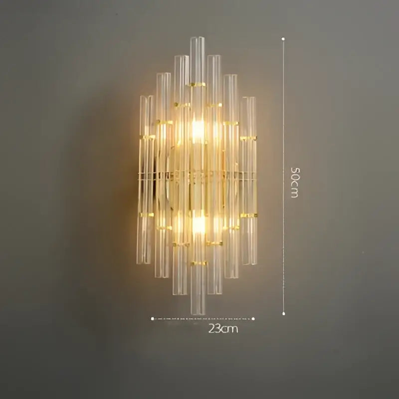 Gold-toned decorbites art deco wall sconce with clear glass tubes vertical cascading design for bedroom corridor lighting