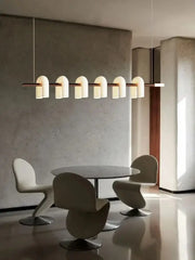 Modern minimalist decorbites art deco white acrylic arched chandelier with six warm-toned glass shades for living room lighting