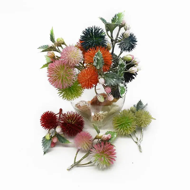 Decorbites™ artificial grass plants featuring a vibrant pink orange green and black spiky flower bouquet in a glass vase with seashells for home decor wedding and gifts