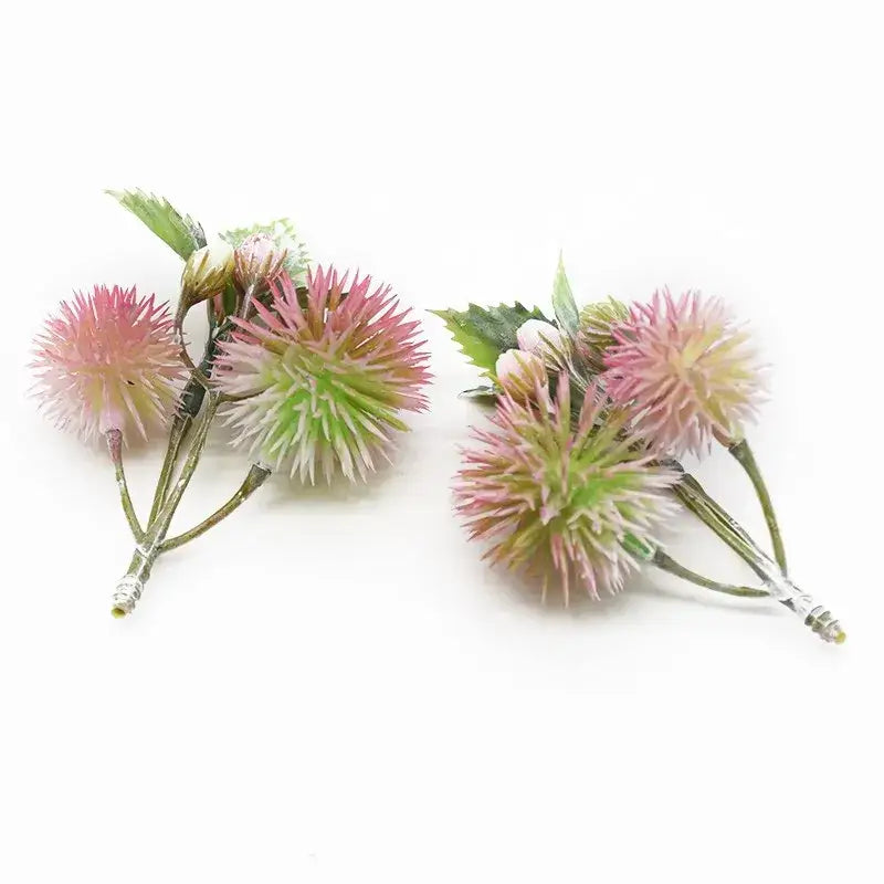 DecorBites™ artificial grass plants featuring pink and green spiky spherical blooms for home decor and events