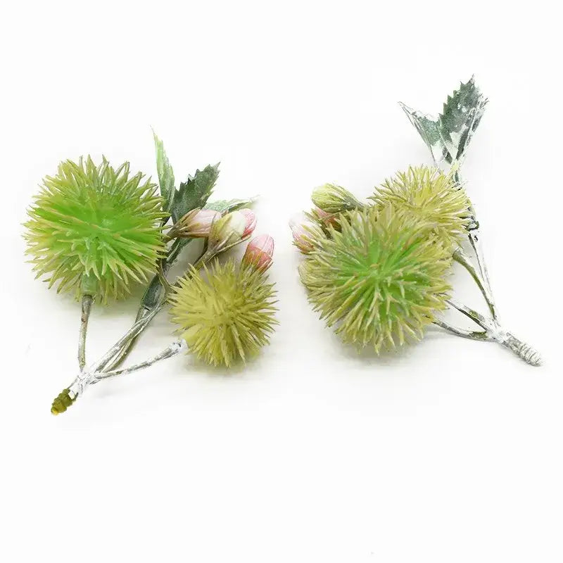 Decorbites™ artificial grass plants featuring green spiky seed pods pink buds and silver-tinted stems for home decor