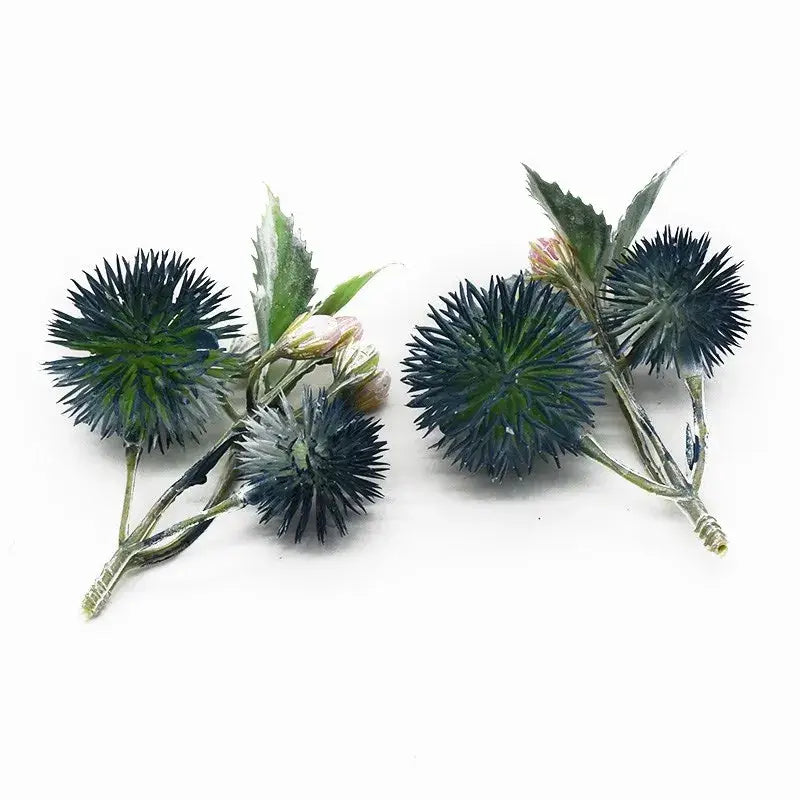 Artificial blue-green thistle flower arrangements with spiky heads and leaves in decorbites artificial grass plants for home decor