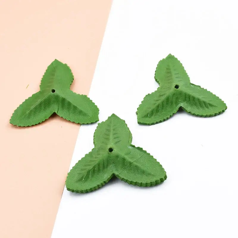 Decorbites artificial green resin beads shaped like textured three-leaf clovers for silk roses and artificial green leaves craft