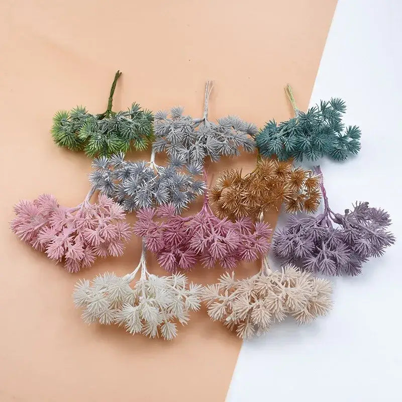 A collection of decorbites™ artificial gypsophila plants in pastel earthy tones crafted from textured plastic material