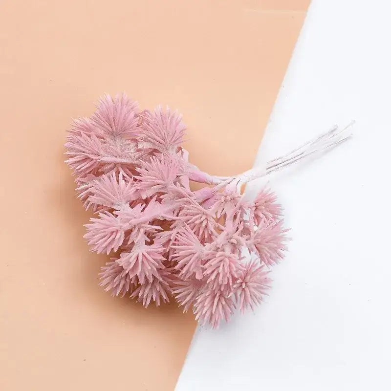 Delicate cluster of pink artificial gypsophila plants with spiky petals and thin white stems for home decor and DIY gifts