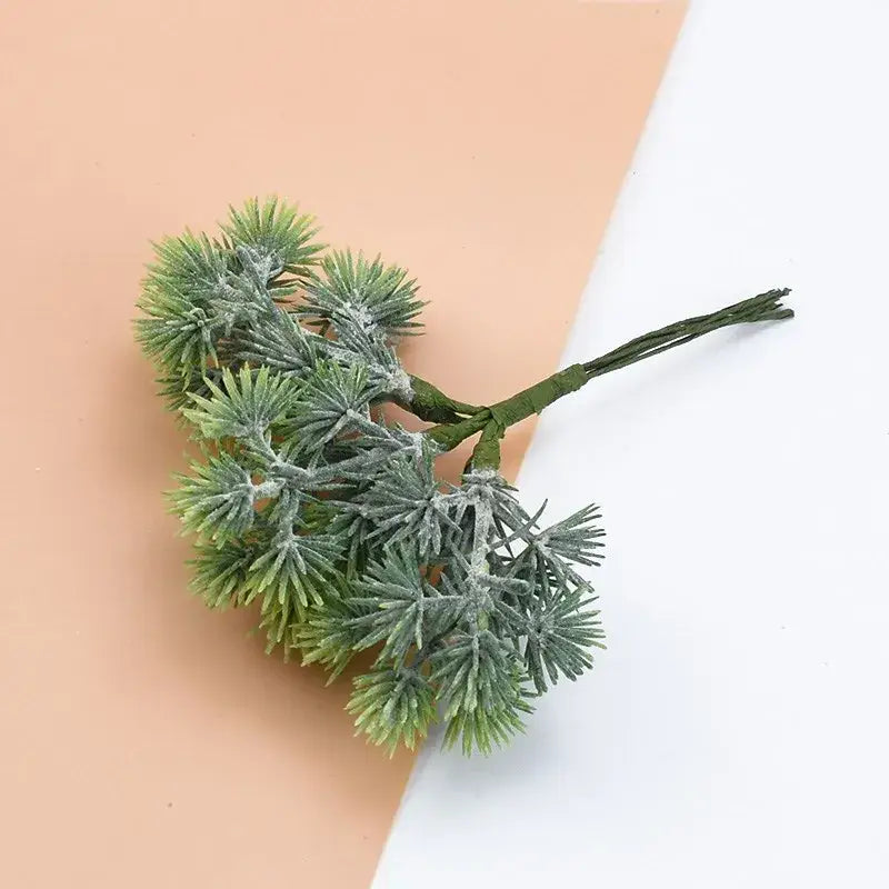 Decorbites™ artificial gypsophila plants featuring frost-dusted green needle-like foliage and a bundled stem for decor