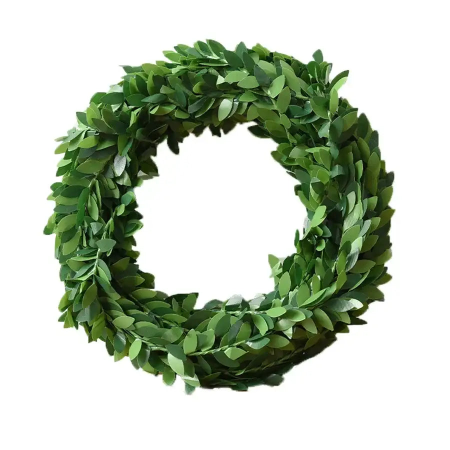A circular ivy leaf wreath made of dense artificial green leaf wreath vines for indoor outdoor decor by decorbites