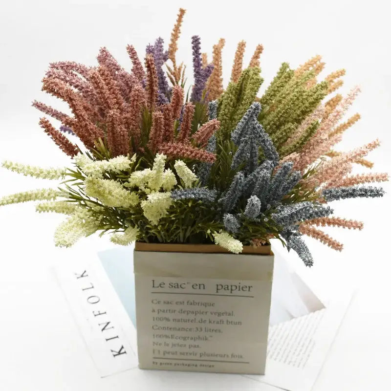 Colorful artificial lavender plants in a beige paper box with french text for home decor and wedding DIY use