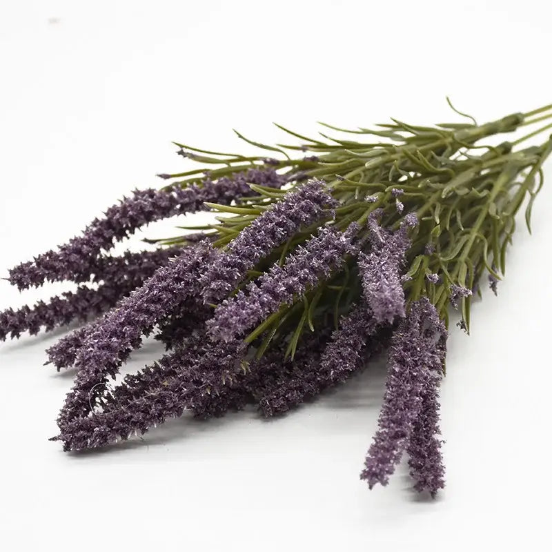 A bundle of deep purple artificial lavender plants with green stems for home decor and wedding diy by decorbites