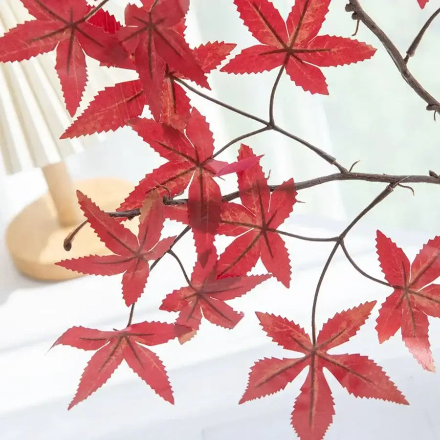 Decorbites artificial maple leaf bouquet features vibrant red artificial maple leaves with detailed veining and dark brown stems