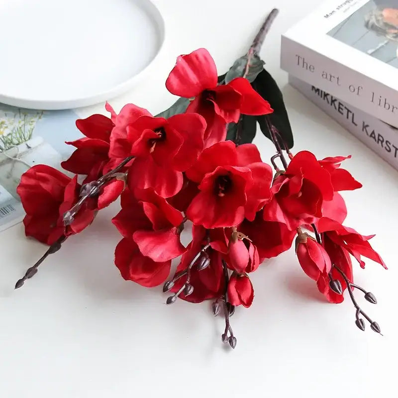 Vibrant red decorbites artificial orchid magnolia bouquet with glossy petals and dark brown stems for home decor and weddings