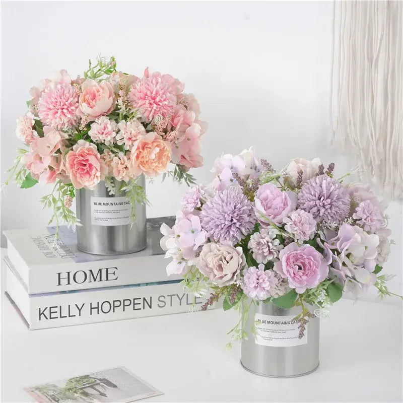 Two pastel decorbites artificial peony flower bouquets with pink peach and lavender blooms in silver containers for decoration