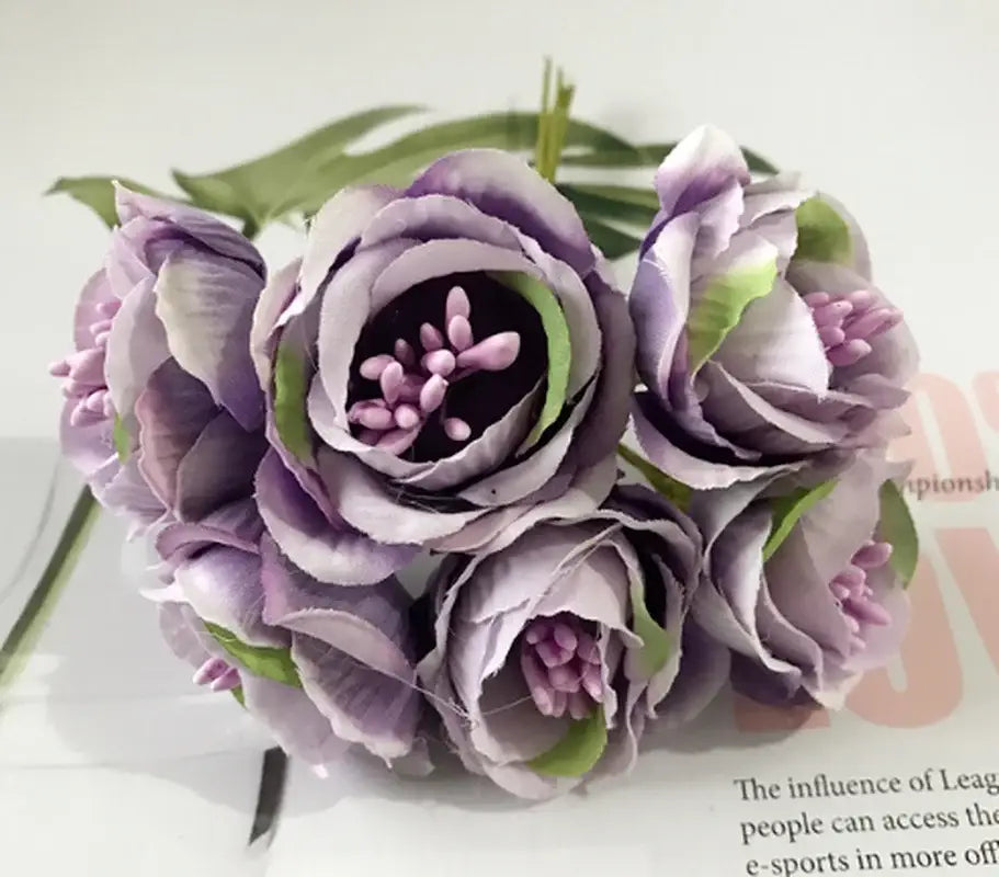 A cluster of decorbites artificial peony tea rose silk flowers in lavender with green accents for home garden wedding decor