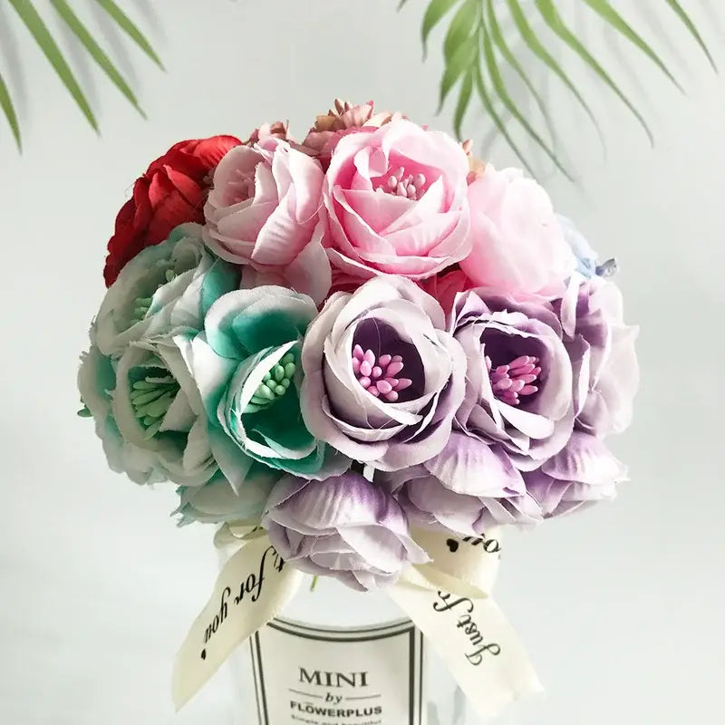 A vibrant decorbites artificial peony bouquet featuring pink purple red and teal silk flowers for home garden wedding