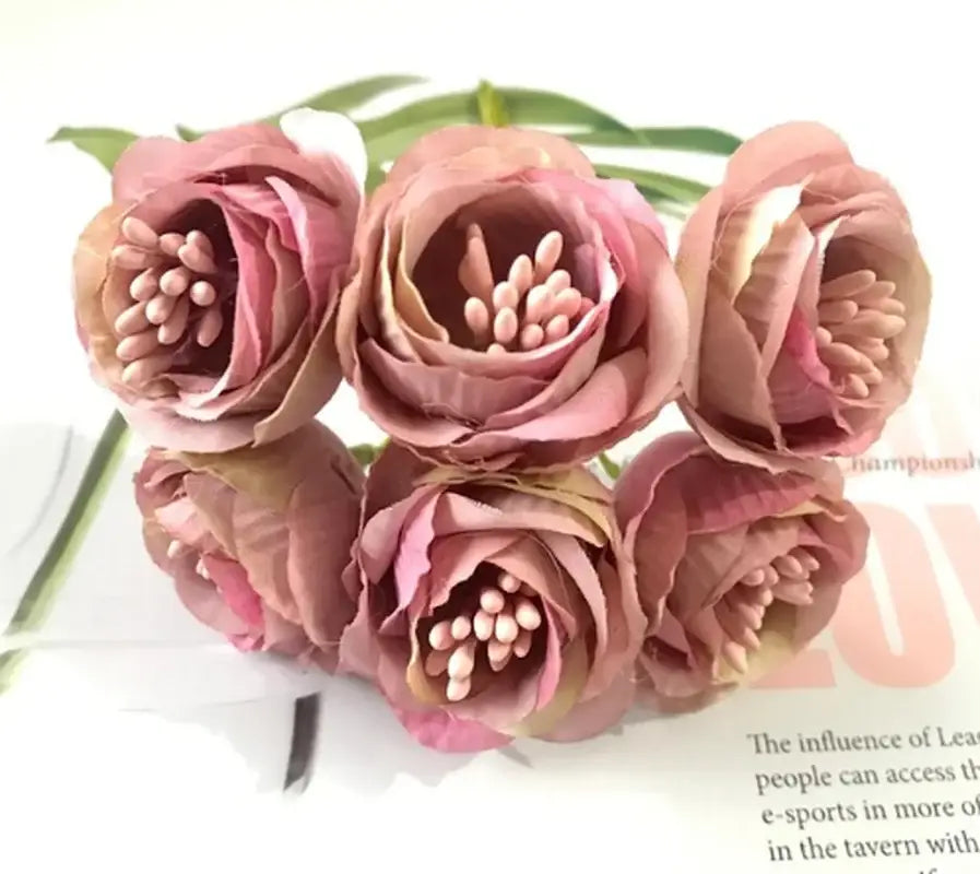 A cluster of soft pink decorbites artificial peony tea rose silk flowers with layered petals and green stems for home decor