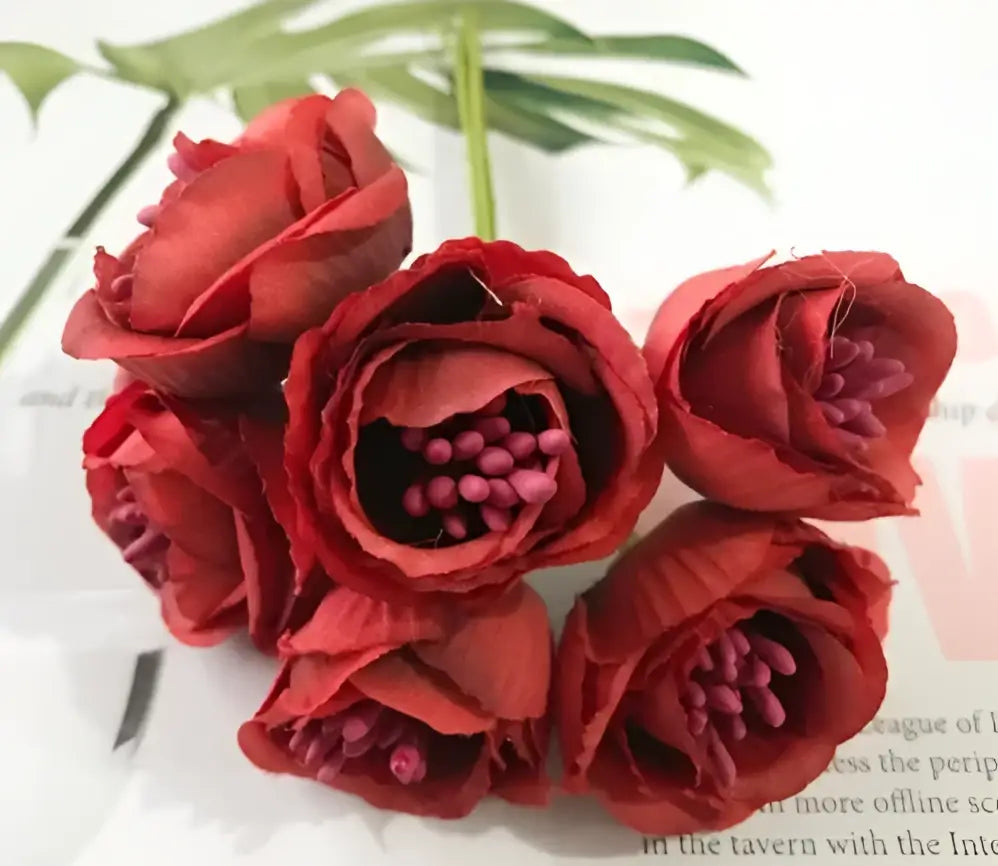 A cluster of decorbites artificial peony tea red roses with layered fabric petals and deep burgundy centers for home decor